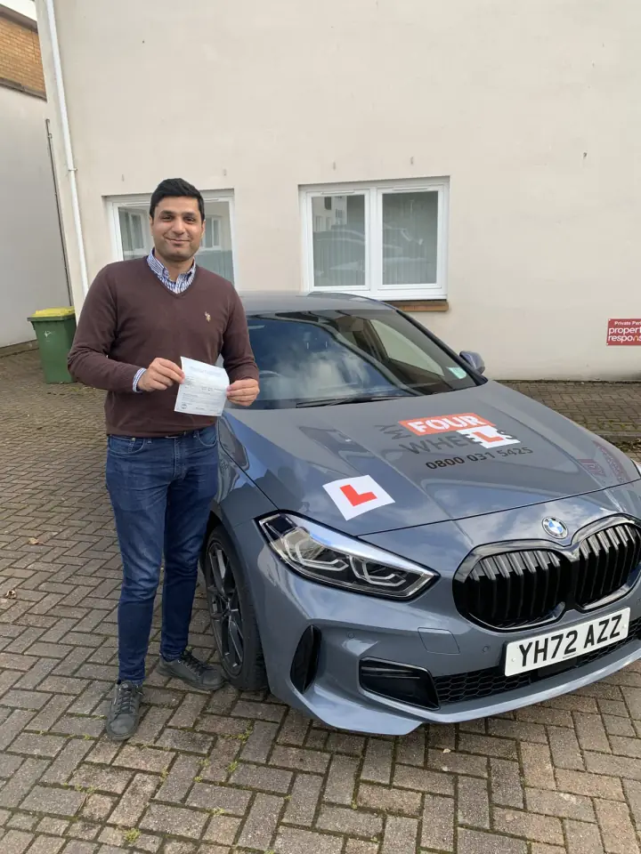 Usman celebrating passing their driving test with Hugh's Wheels